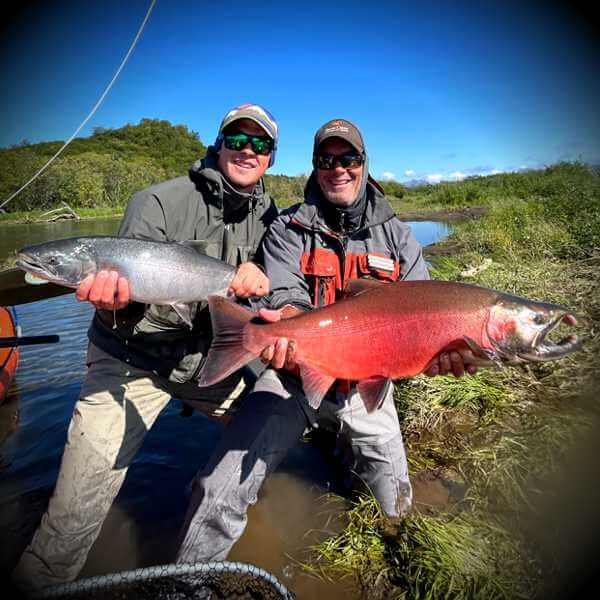 Angler holding a large Alaska Salmon