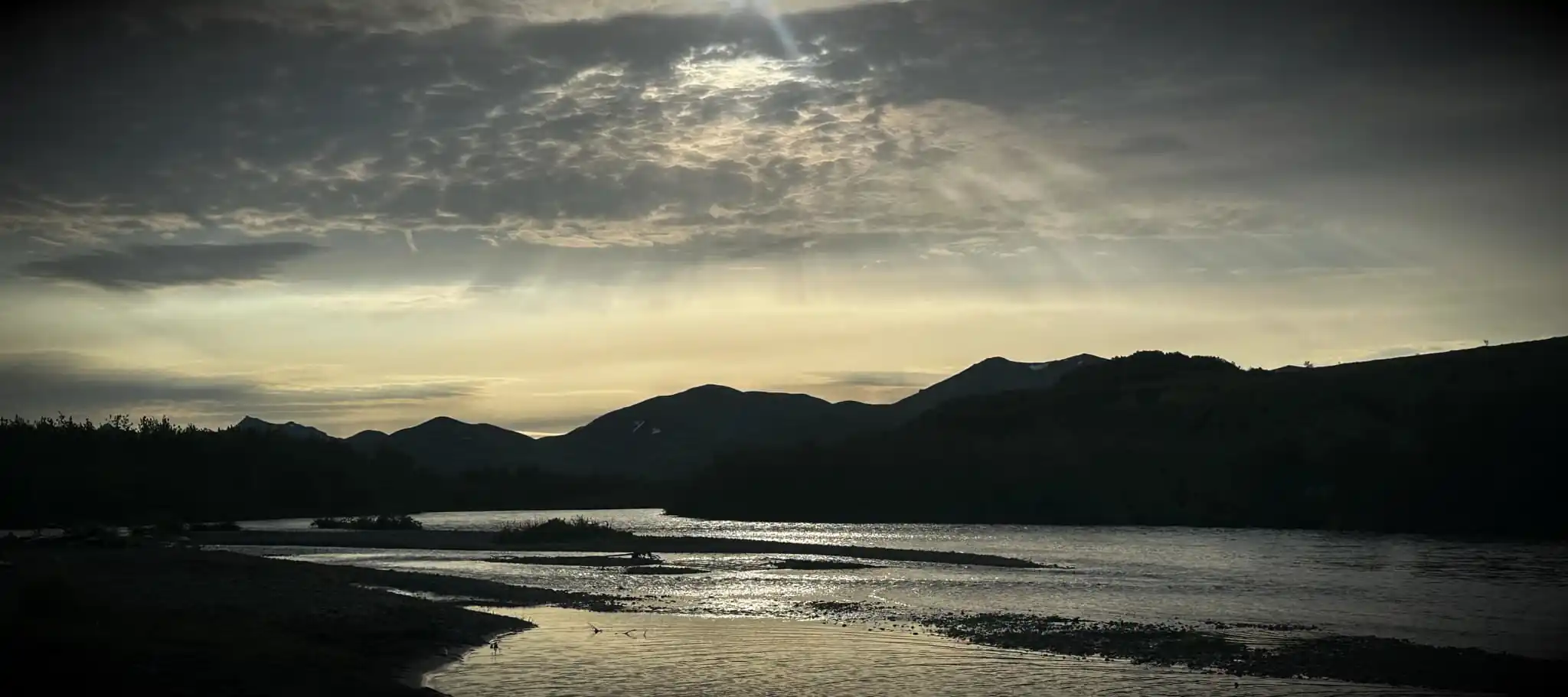 Wide view of a remote Southwest Alaska river bend with no one else in sight